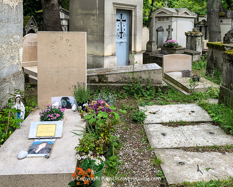 This recent Pere Lachaise grave contains the remains of Suzon Carrigues (1994-2015), killed by terrorists who attacked the Bataclan This recent Pere Lachaise grave contains the remains of Suzon Carrigues (1994-2015), killed by terrorists who attacked the Bataclan
