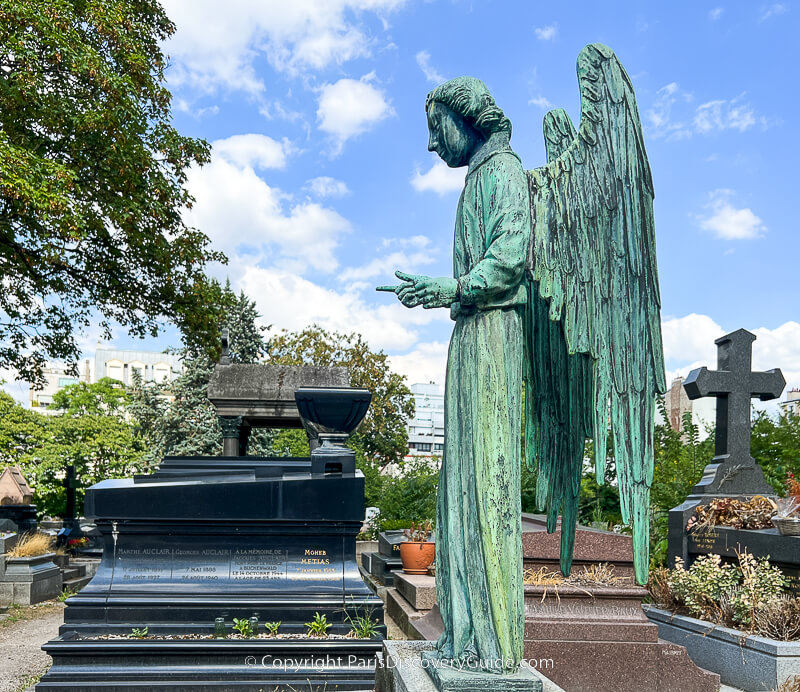 Sculpture and tombstones at Pere Lachaise Cemetery