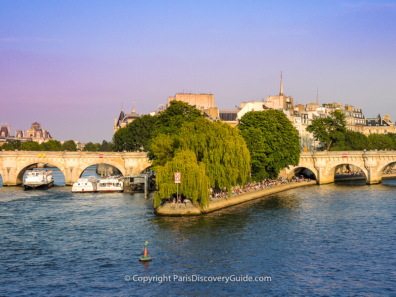 Paris Motor Show - top Paris October event Pont Neuf bridge over the western end of Ile de la Cité, with the Square du Vert-Galant park on