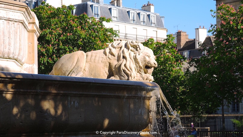 Lion sculpture on fountain dating back to mid-1800s in front of Church of Saint-Sulplice in the 6th Arrondissement in Paris Lion sculpture on fountain dating back to mid-1800s in front of Church of Saint-Sulplice in the 6th Arrondissement in Paris