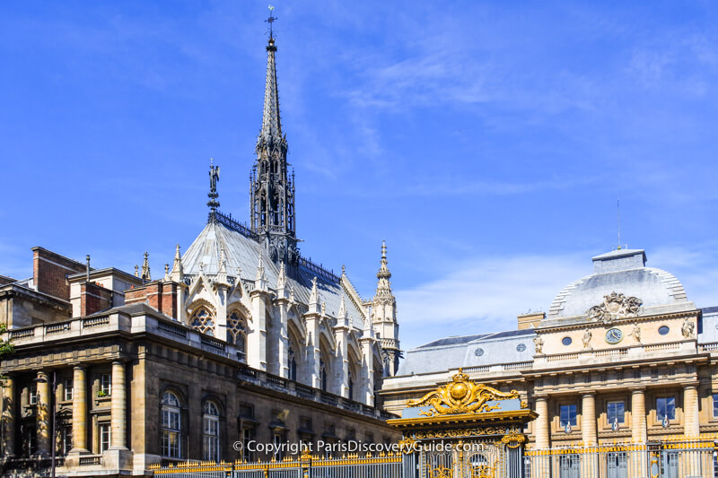 Steeple and spires of Sainte Chapelle behind the Palais de Justice Steeple and spires of Sainte Chapelle behind the Palais de Justice