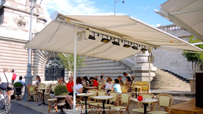 Paris in August - Relaxing in a hidden corner of a quai overlooking the Seine River Paris in August - Relaxing in a hidden corner of a quai overlooking the Seine River