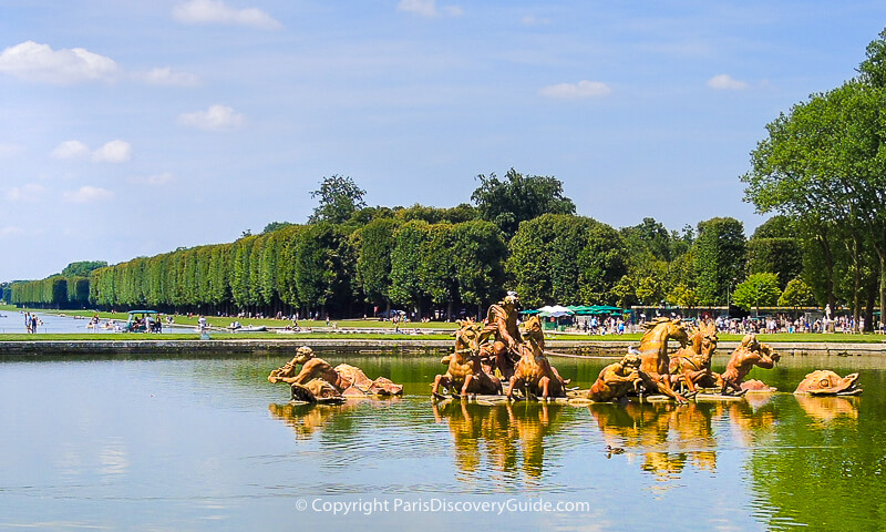 Apollo Fountain and Grand Canal at Versailles, attractions seen during a guided tour of the Palace gardens Apollo Fountain and Grand Canal at Versailles, attractions seen during a guided tour of the Palace gardens