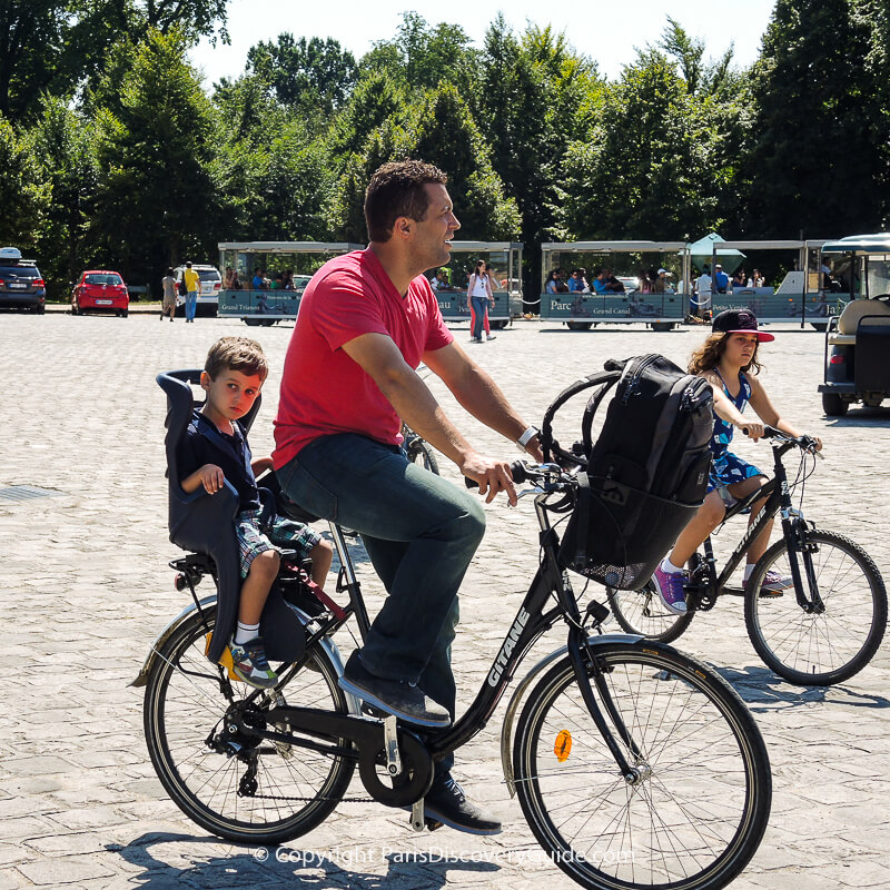 Bikers on Palace of Versailles Estate near Paris