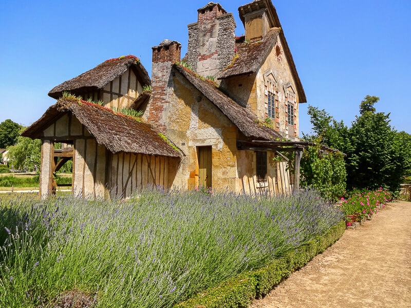 The rustic Flemish-style mill house (the mill wheel is on the other side) and lavender garden in Marie Antoinette's Hamlet in the park of the Château de Versailles - Photo credit: Alexandre Breveglieri The rustic Flemish-style mill house (the mill wheel is on the other side) and lavender garden in Marie Antoinette's Hamlet in the park of the Château de Versailles - Photo credit: Alexandre Breveglieri
