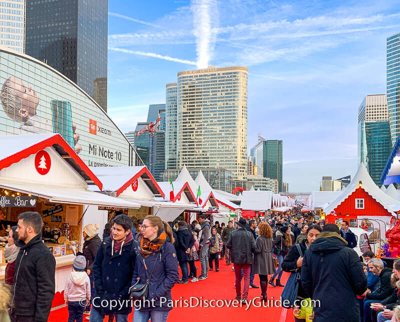 Inside the Grande Arche end of the La Defense Christmas Market (the arched building on the left is CNIT)