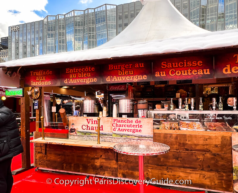 Cart selling hot roasted chestnuts at Magie de Noel