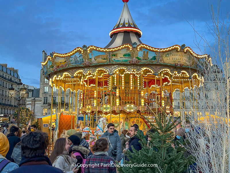 The Belle-Epoque-style carousel at Hotel de Ville Christmas Market The Belle-Epoque-style carousel at Hotel de Ville Christmas Market