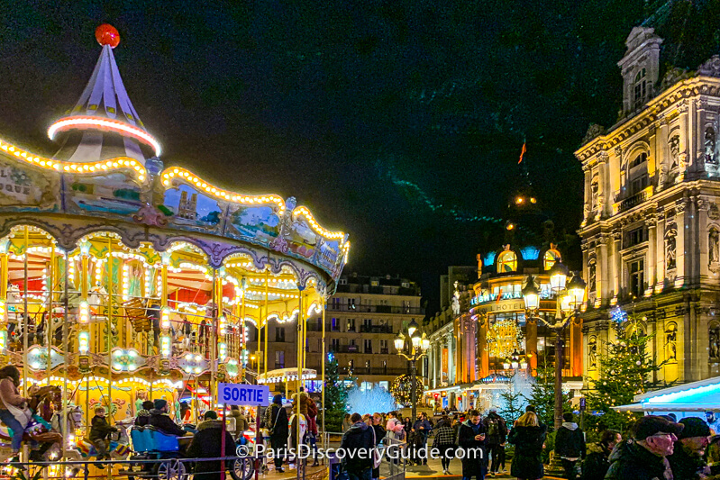 Carousel at Hotel de Ville Christmas Market - that's the BHV department store in the backgound