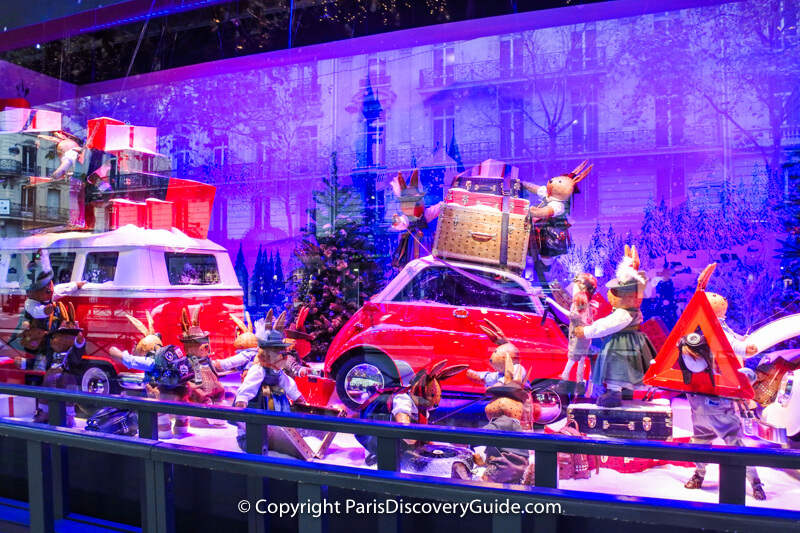 The children bring back all the wonderful gifts they found in fully-packed Citroens, as a large band of rabbits help them unload The children bring back all the wonderful gifts they found in fully-packed Citroens, as a large band of rabbits help them unload