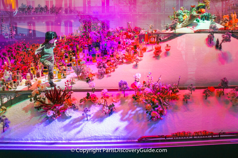 In this Printemps Haussmann window display, children take various types of transportation in their search for Christmas gifts