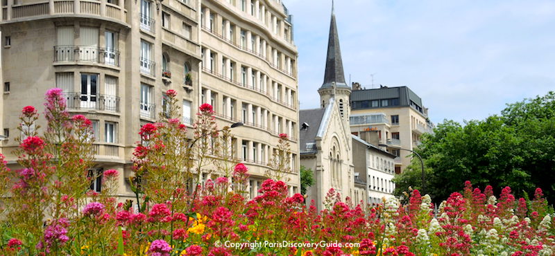 Flowers blooming in a public square in the Batignolles neighborhood in Paris's 17th Arrondissement