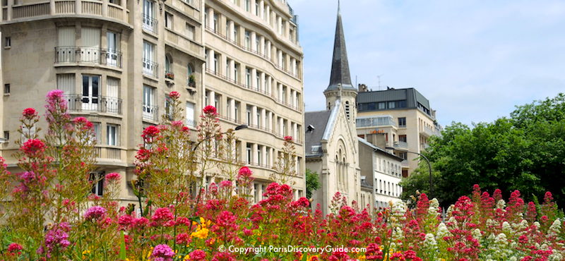 Flowers blooming in a public square in the Batignolles neighborhood in Paris's 17th Arrondissement Flowers blooming in a public square in the Batignolles neighborhood in Paris's 17th Arrondissement