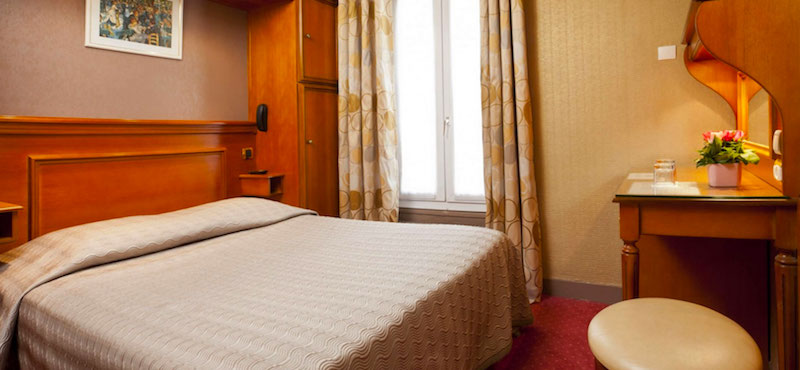 Guestroom at Hôtel Élysée Étoile in Paris's 17th Arrondissement Guestroom at Hôtel Élysée Étoile in Paris's 17th Arrondissement