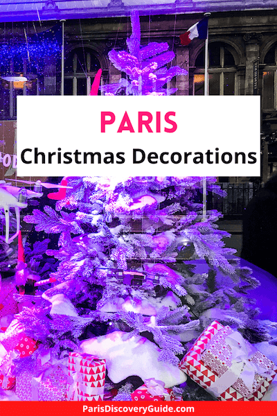 Christmas tree display in store window at BHV department store in Le Marais neighborhood in Paris
