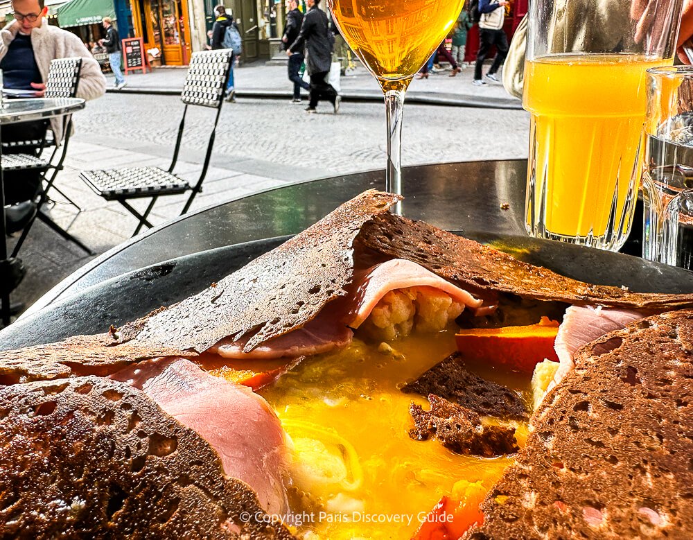 Freshly made crepe filled with nutella at a market stand in the Latin Quarter