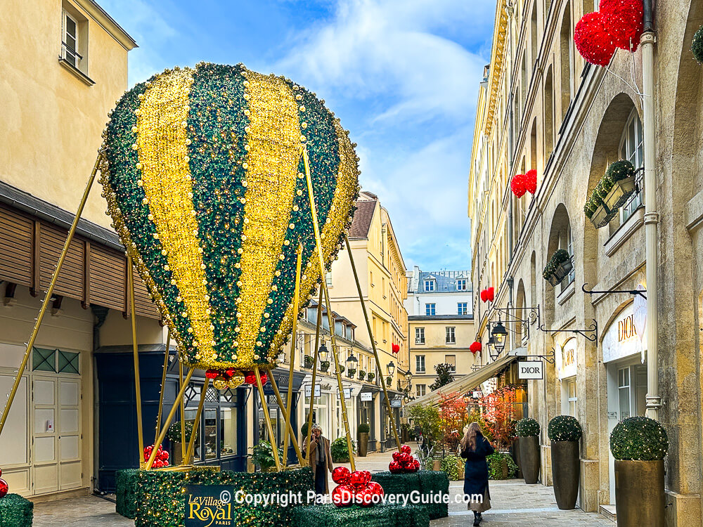 Christmas decorations in Le Village Royal passage