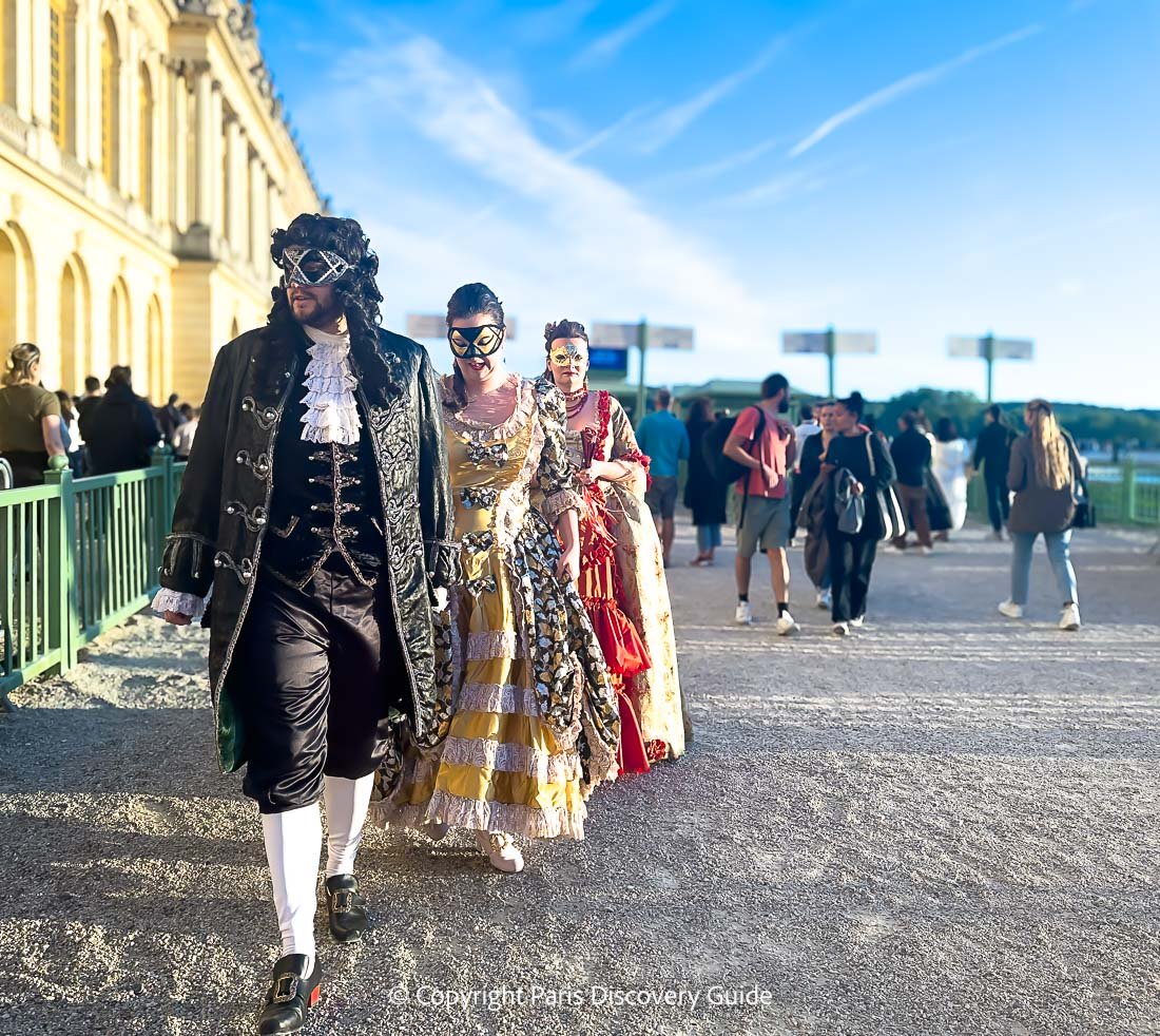 Guests of Versailles' Grand Masked Ball on their way to the annual June event Guests of Versailles' Grand Masked Ball on their way to the annual June event