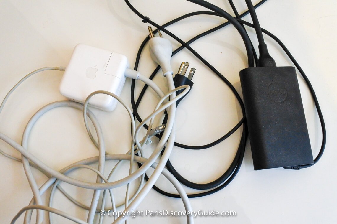 Apple and Dell laptop power supplies with built-in voltage transformers Apple and Dell laptop power supplies with built-in voltage transformers