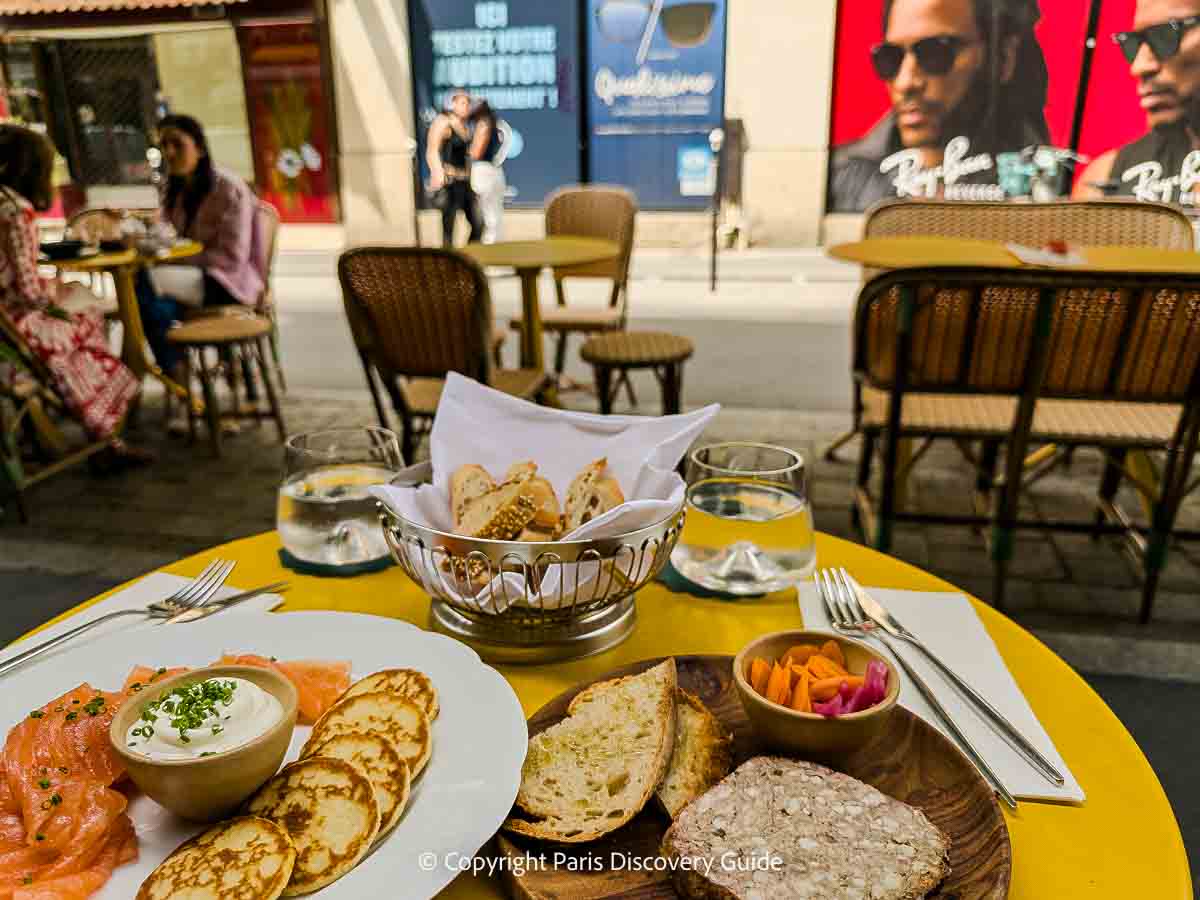Cafes and fruit markets along Rue Cadet near Le Fantaisie Cafes and fruit markets along Rue Cadet near Le Fantaisie