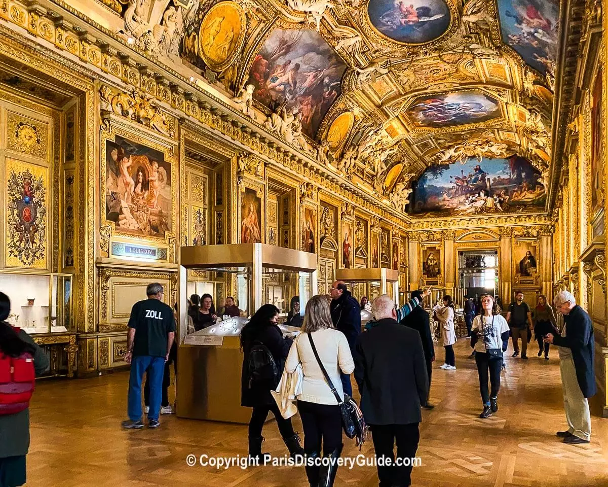 Does this winged man carrying a scythe painted on a ceiling near the Louvre's Apollo Gallery represent Zeus, Greek god of the sky, lightning, and thunder?