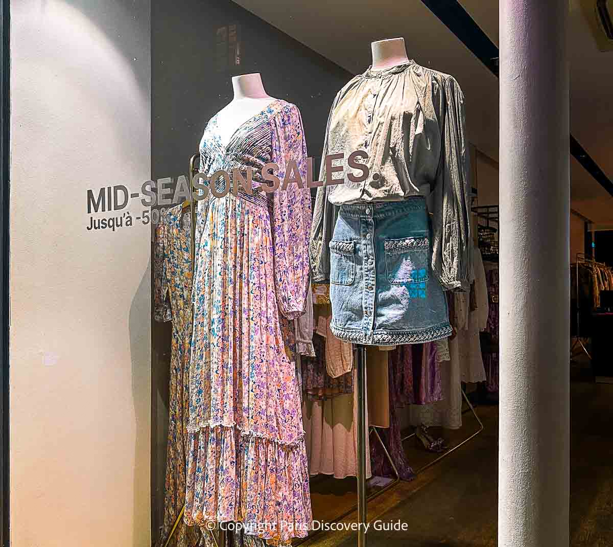 Sales sign in a boutique on Rue Saint-Dominique in Paris 7 about 3 weeks before the Summer Sales began