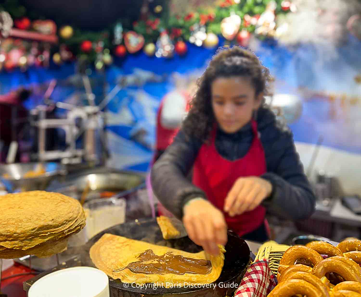Freshly made crepe filled with nutella at a market stand in the Latin Quarter