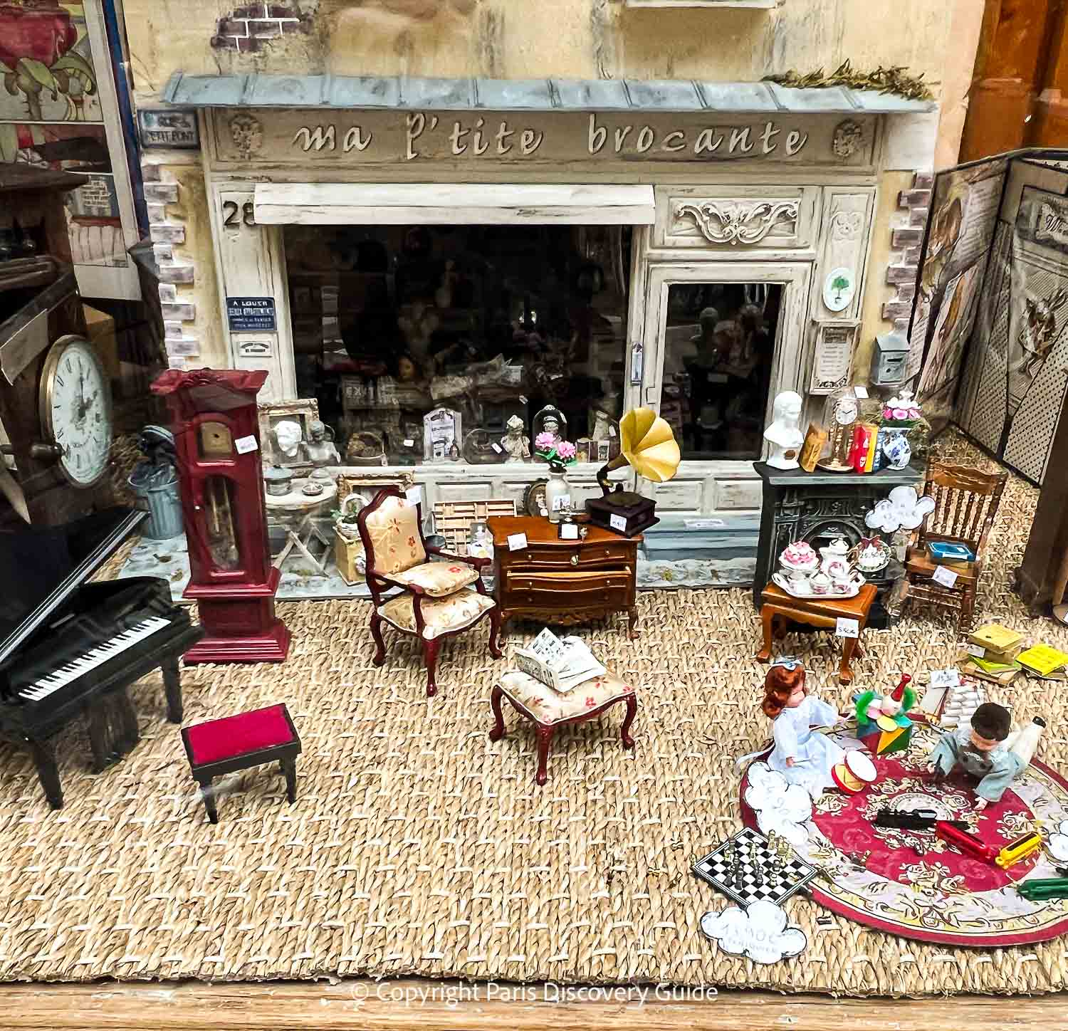 Doll house furnishings at Pain d'Epices toy store in Passage Jouffroy