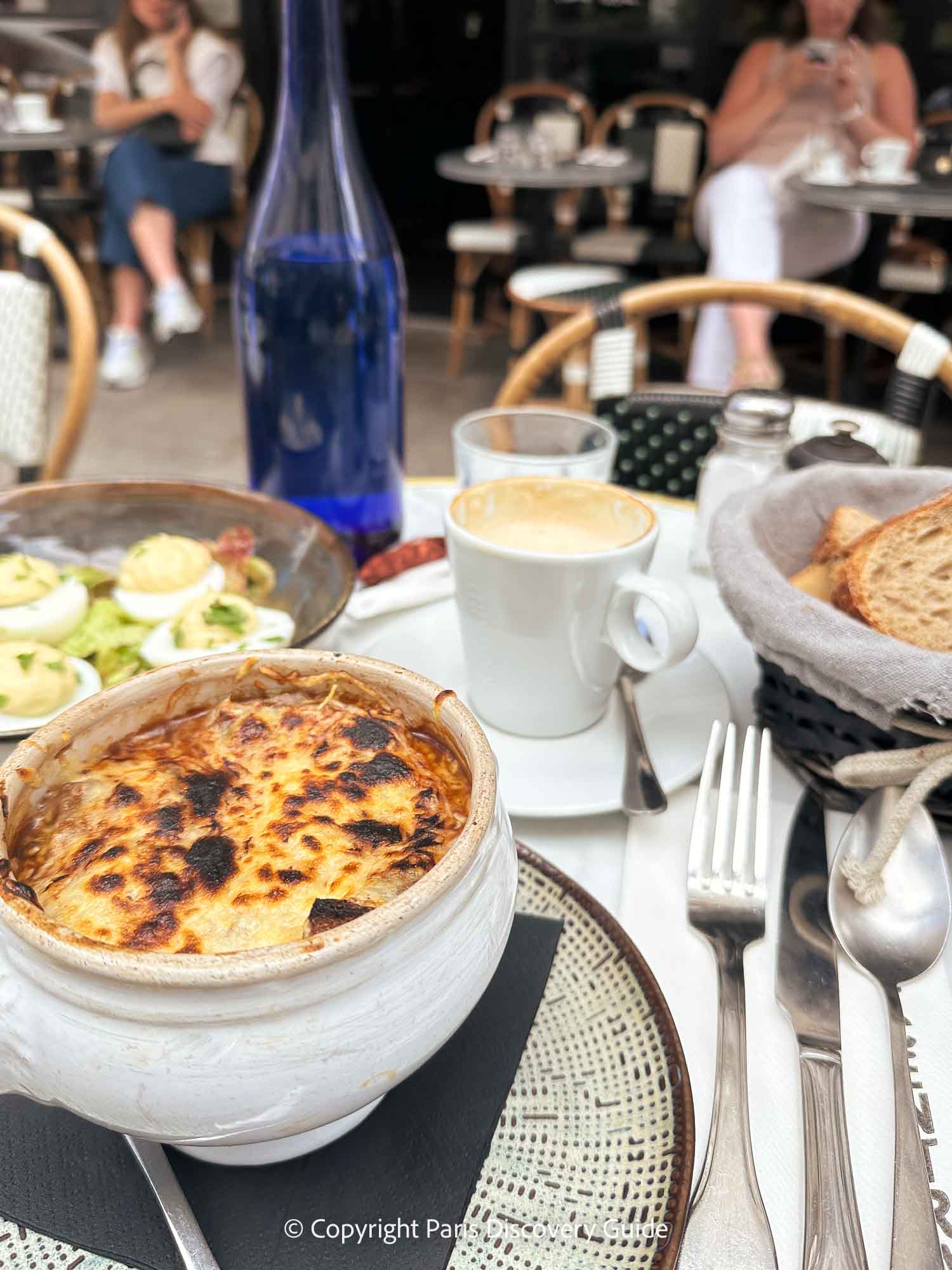 My late-morning brunch of eggs mayo, onion soup, and a café crème at Bar du Central