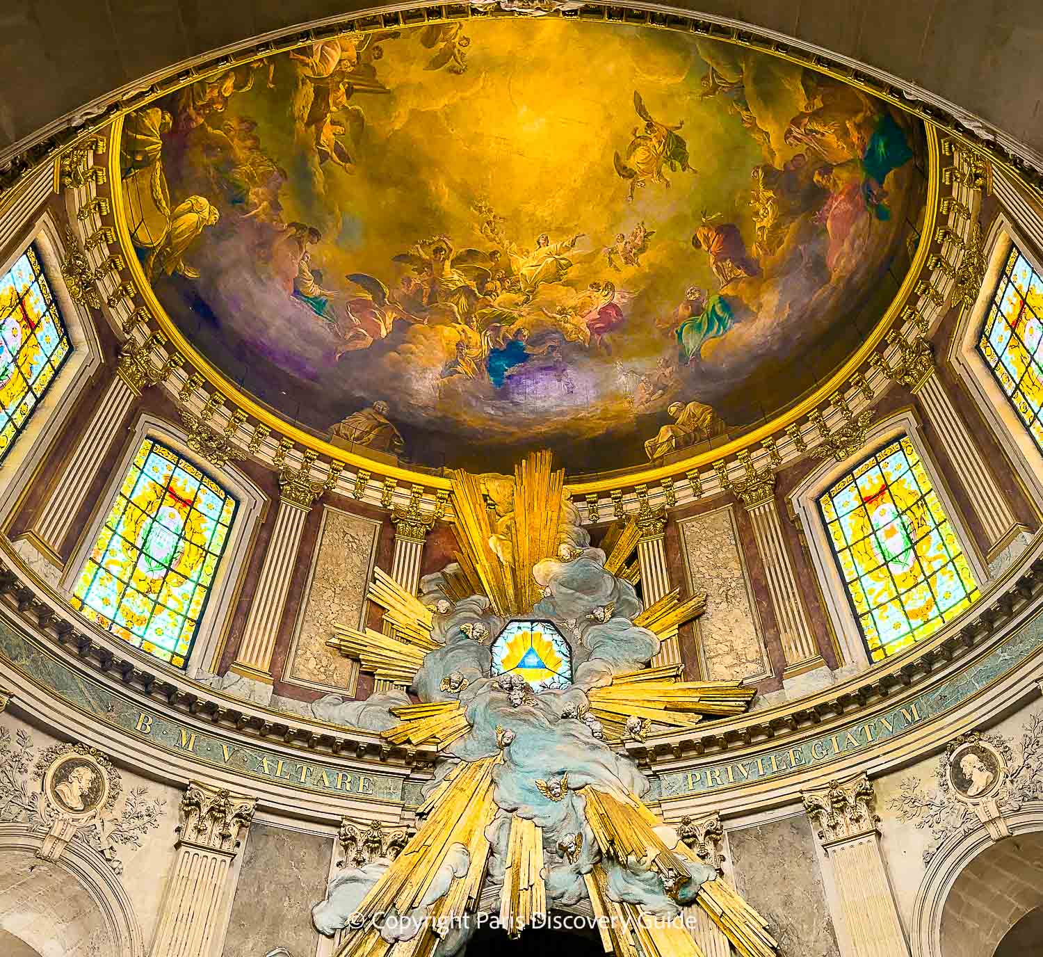 The flamboyant Baroque dome above the altar at Saint-Roch Church