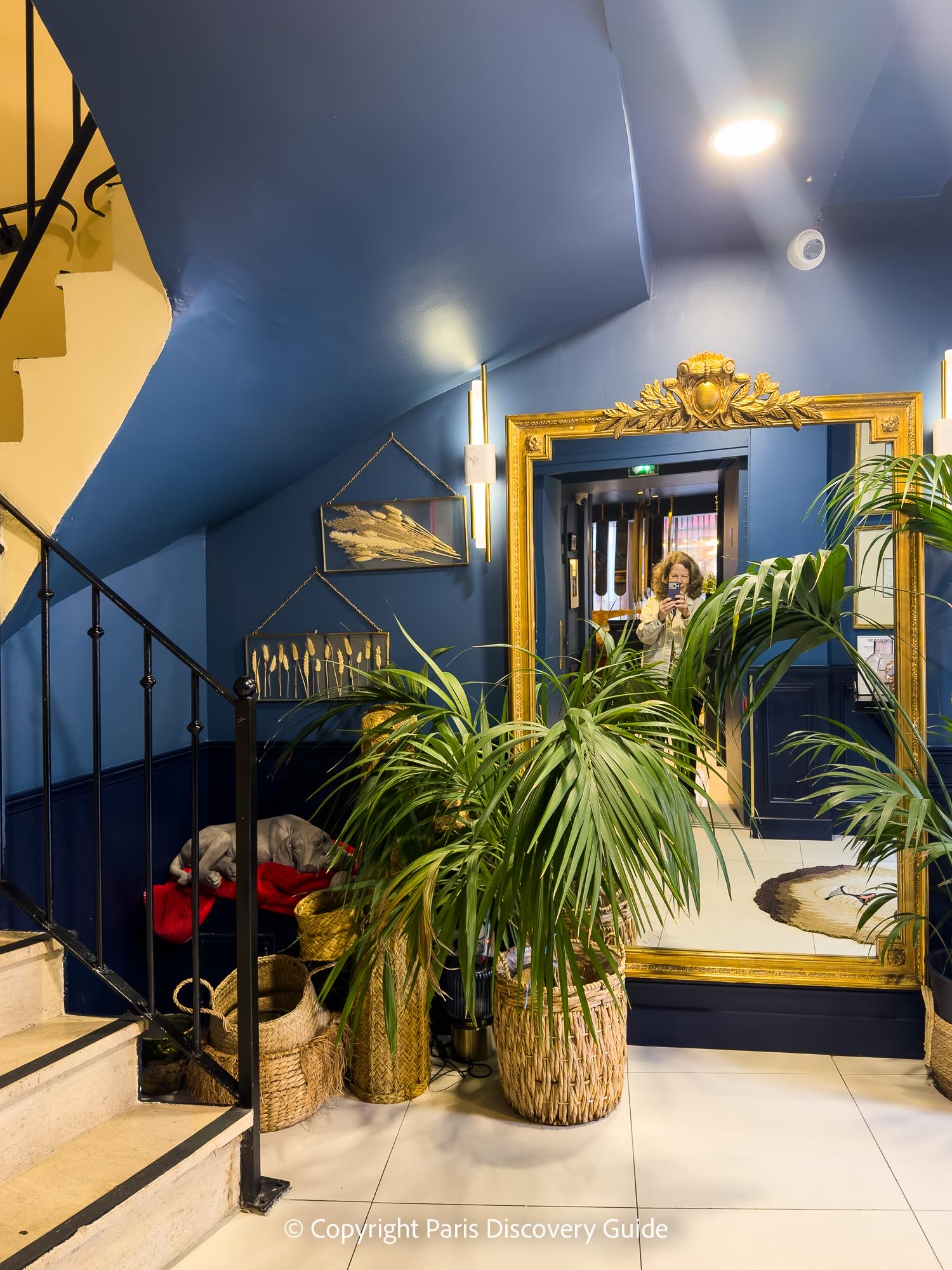 A small corner near the stairs and elevators at Welcome Hotel