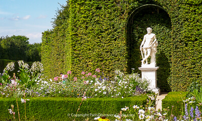 Formal garden room and statue at Versailles Gardens Formal garden room and statue at Versailles Gardens