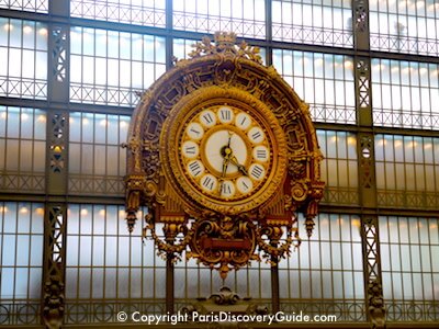 Ornate clock in Musee d'Orsay in Paris Ornate clock in Musee d'Orsay in Paris