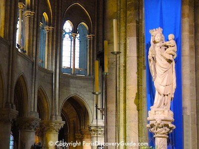 Madonna and child statue in the Notre Dame Cathedral in Paris Madonna and child statue in the Notre Dame Cathedral in Paris