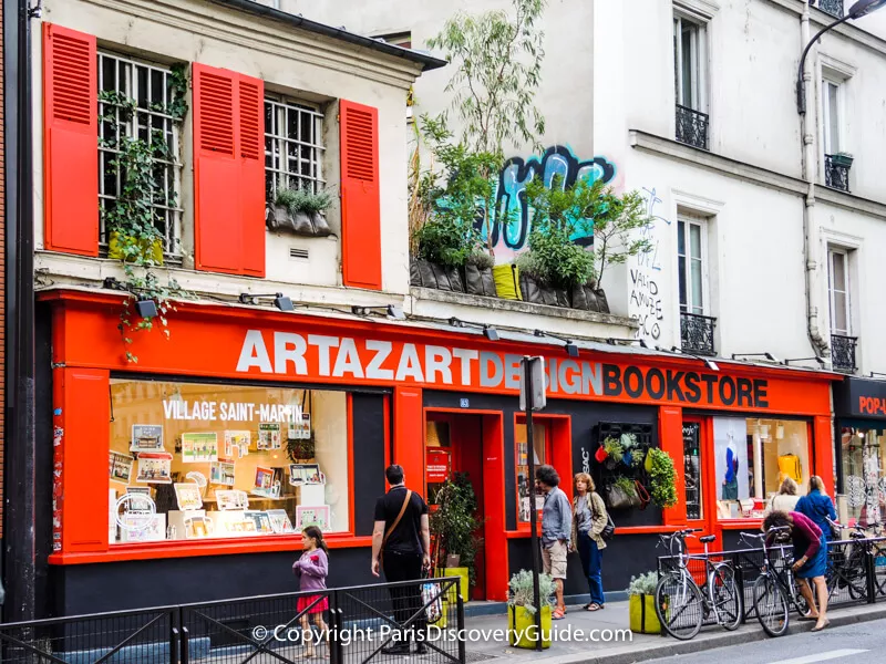 Artazart "concept" bookstore where art and design books, an eclectic assortment of other items, and exhibitions and events share space in an eye-catching storefront overlooking Canal Saint Martin