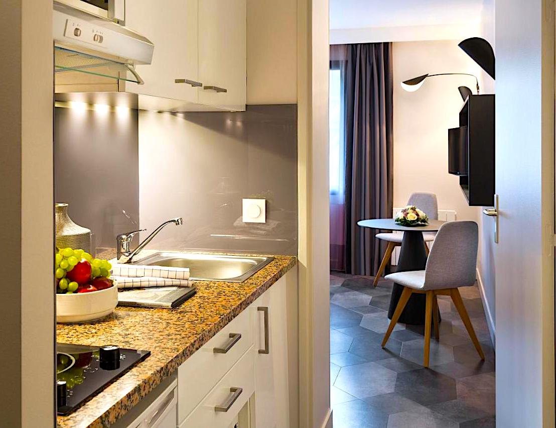 Kitchen in a studio at Citidines Trocadero Paris