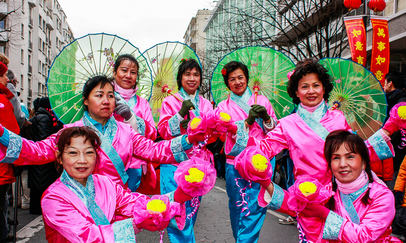 Dancers marching in the Chinese New Year Parade near Place d'Italie in the 13th arrondissement in Paris - Photo credit: Adrian Tombu, Creative Commons license Dancers marching in the Chinese New Year Parade near Place d'Italie in the 13th arrondissement in Paris - Photo credit: Adrian Tombu, Creative Commons license