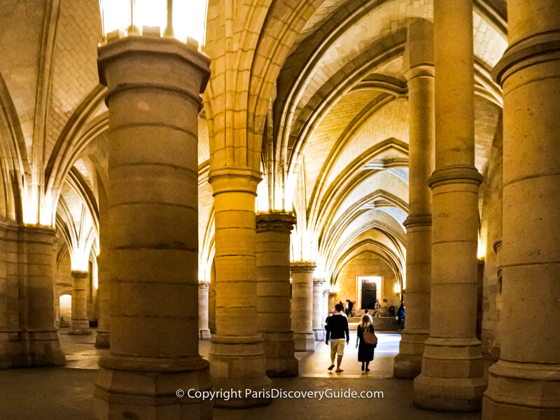 Walking through the Hall of Soldiers at La Conciergerie