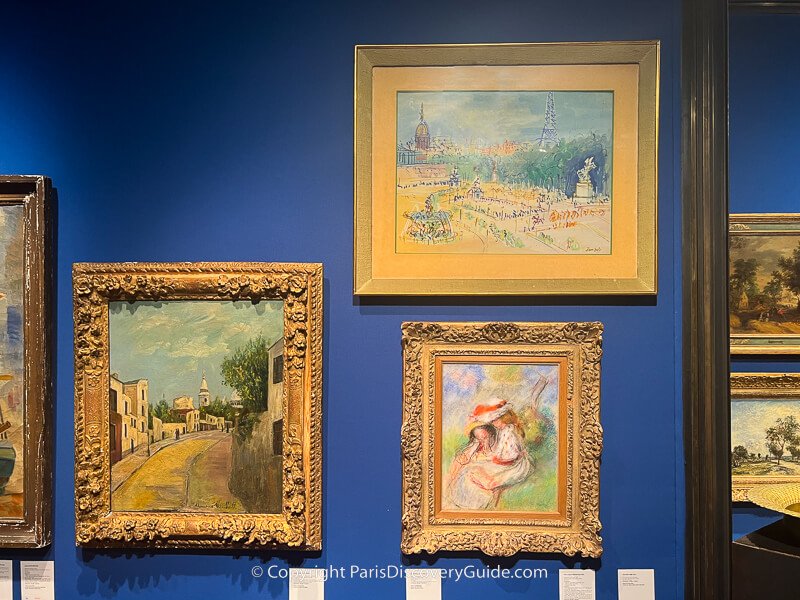 Paintings by Renoir and Dufy on display before being auctioned at Hotel Drouot in Paris