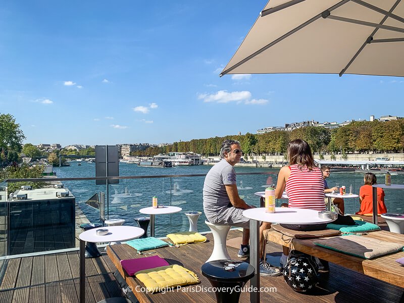 Rooftop terrace at Fluctuart, floating art venue on the Seine River