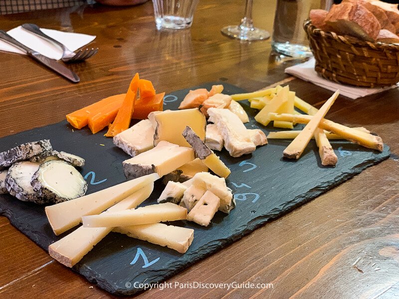 French cheeses arranged for tasting with wine