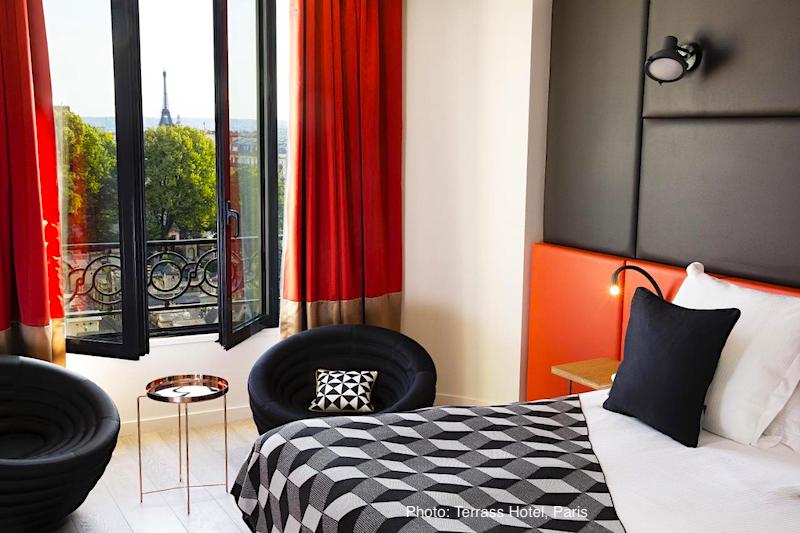Paris skyline view with the Eiffel Tower from Terrass Hotel guest room Paris skyline view with the Eiffel Tower from Terrass Hotel guest room