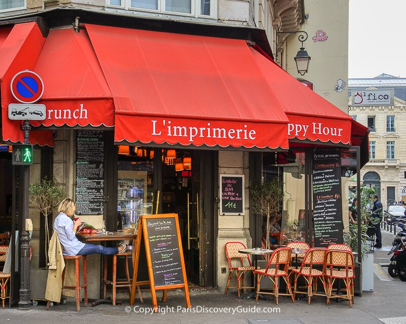 Cafe on Rue Coquillerie near Les Halles on a slightly chilly day in late June