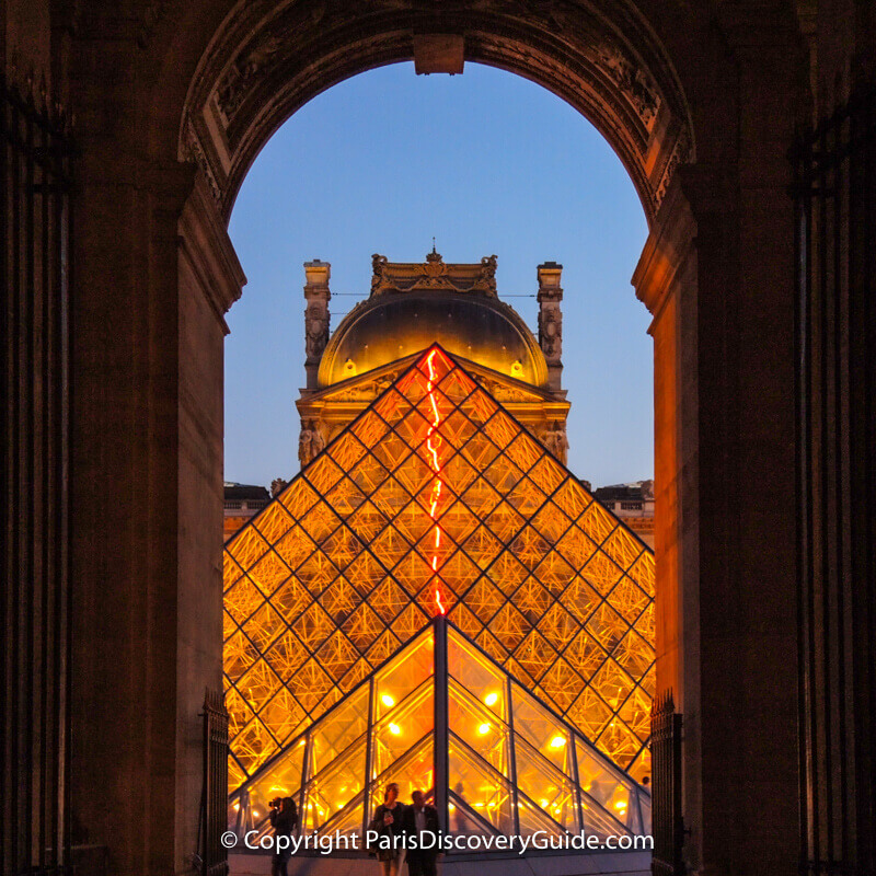 The Louvre and Pyramid at night from the Richelieu Passage