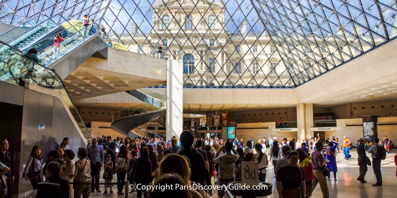 Inside the Louvre Museum under the glass pyramid Inside the Louvre Museum under the glass pyramid