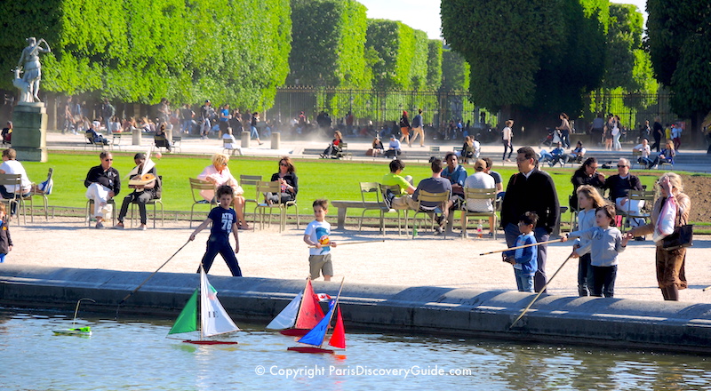 Sailing boats in the pool in Luxembourg Garden in May Sailing boats in the pool in Luxembourg Garden in May