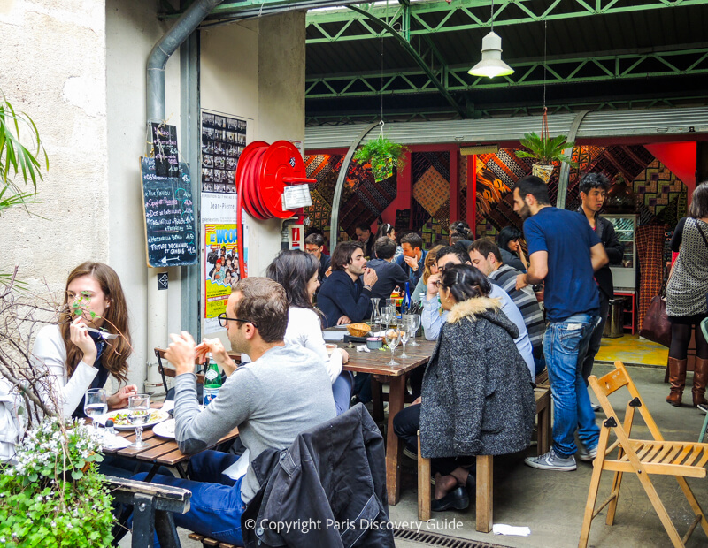 Outdoor terrace seating at Marche des Enfants Rouges near Hotel Sookie