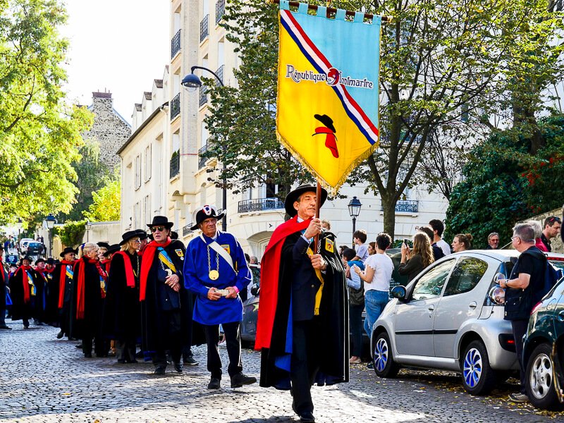 Marchers in the huge Grape Harvest Festival parade in Montmartre - Photo credit: Paul Gueu