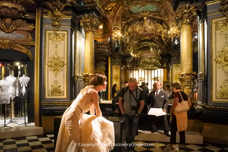 Part of a series of scenes at Musee Grevin with wax figures depicting French achievements in fashion design  