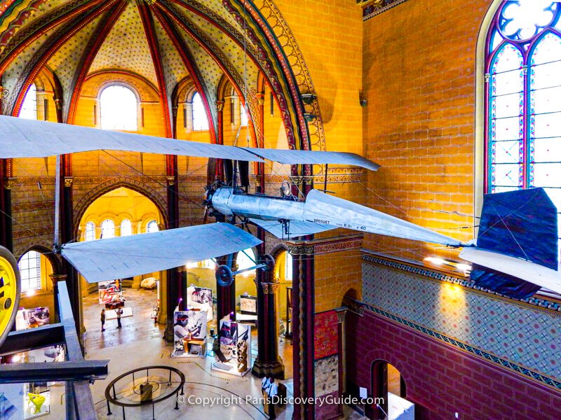 Early flying machine hanging from the ceiling in Museum of Arts and Crafts in Paris